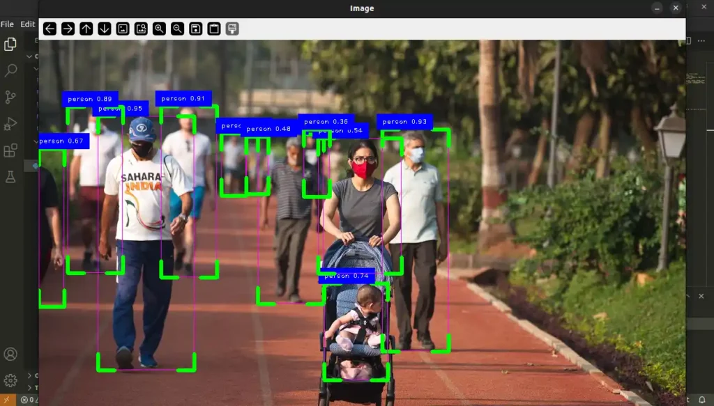 YOLO detection of 12 persons in a park scene, with people walking