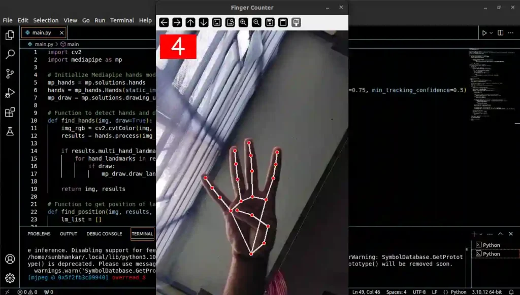 Screenshot of a code editor with a hand showing four fingers, the number 4 displayed at the top corner