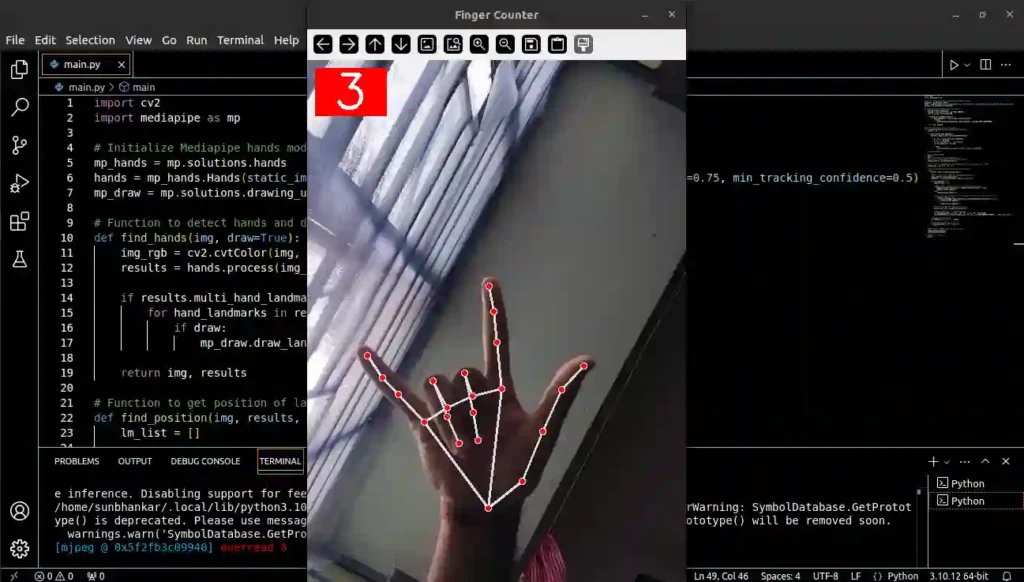 Screenshot of a code editor with a hand showing three fingers, the number 3 displayed at the top corner