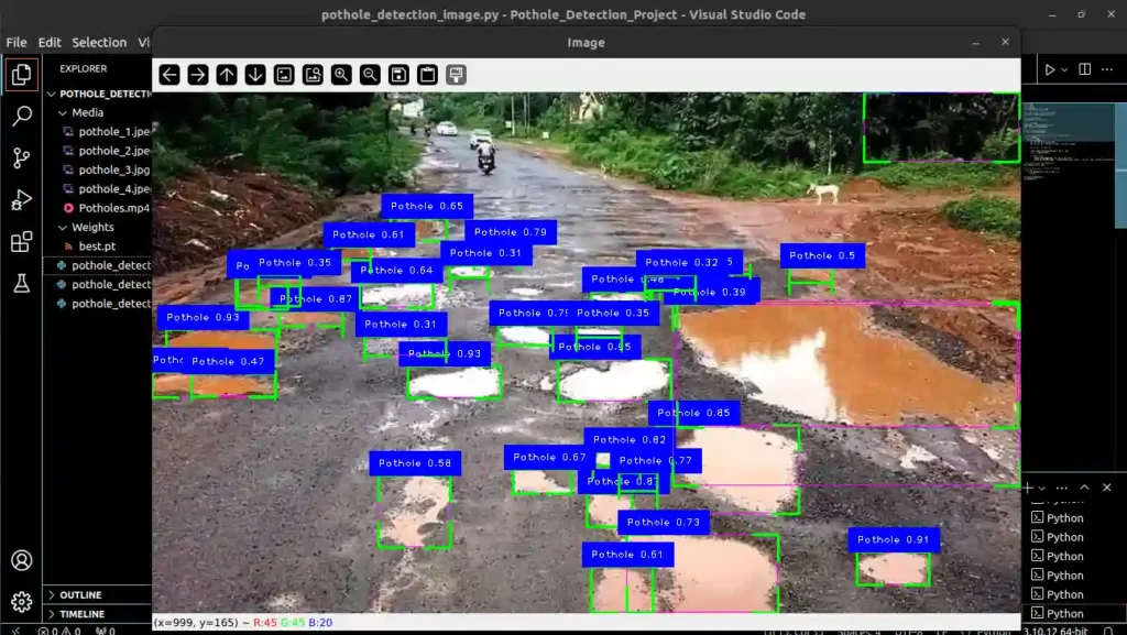 Bad road with multiple potholes filled with muddy water, detected by a Python program using YOLOv8 for pothole detection.